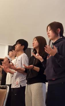YEM students praying